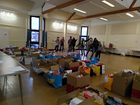 Christmas Hampers boxed up by volunteers in St Peter and St Paul's Church